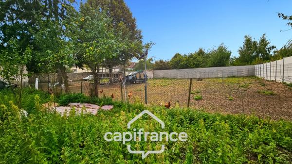 Grande maison à fort potentiel-divisible en 5 appartements- un terrain constructible- des travaux de rénovation-