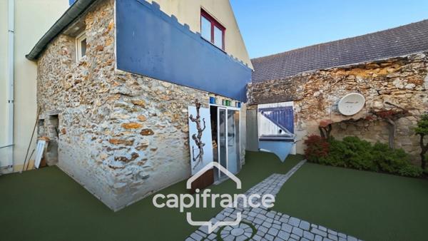 Grande maison à fort potentiel-divisible en 5 appartements- un terrain constructible- des travaux de rénovation-