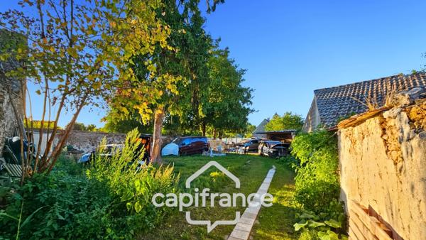 Grande maison à fort potentiel-divisible en 5 appartements- un terrain constructible- des travaux de rénovation-