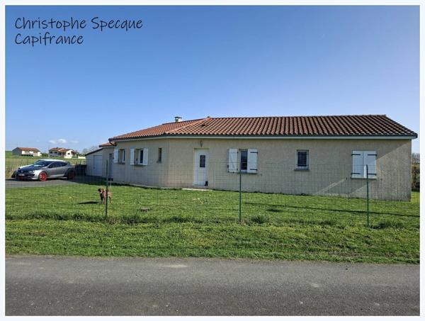 Plain-pied lumineux avec piscine dans secteur calme