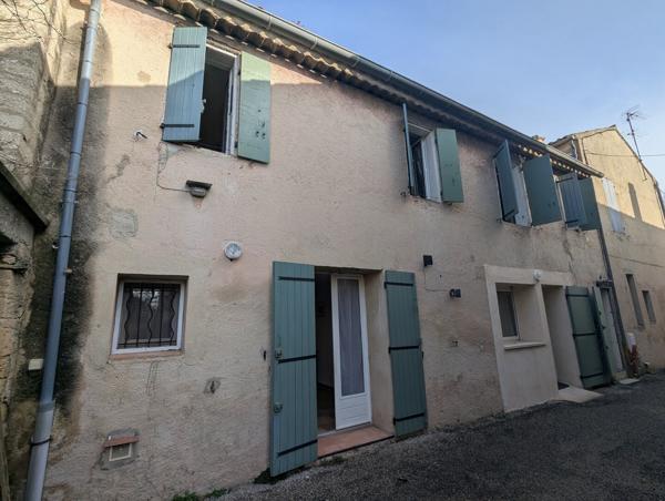 Immeuble de 2 appartements + jardin dans le village