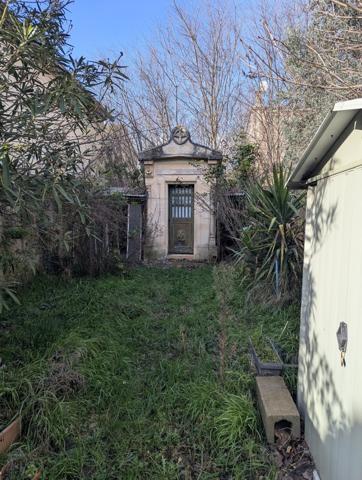 Immeuble de 2 appartements + jardin dans le village