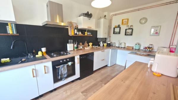 Maison  non mitoyenne 3 chambres avec vie de plain-pied, garage et stationnement à SAINT NAZAIRE quartier MEAN PENHOET