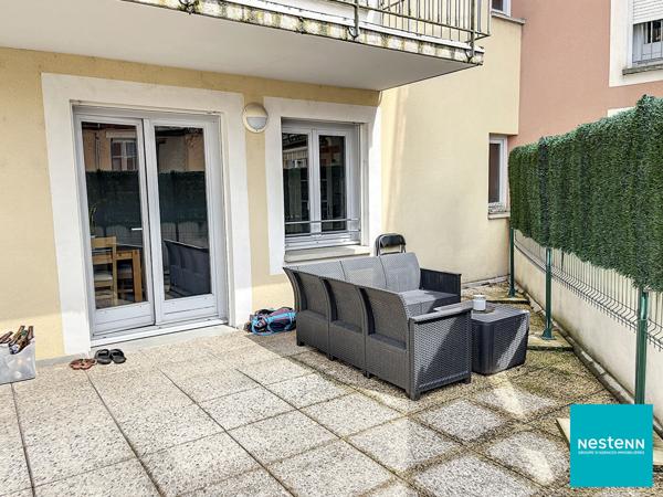 Centre de Feurs appartement 2 pièce(s) 52,2 m2 avec terrasse, place de parking privée et Cave.