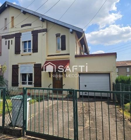 Maison mitoyenne d'un coté,3 chambres,garage...