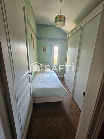 Maison mitoyenne d'un coté,3 chambres,garage...