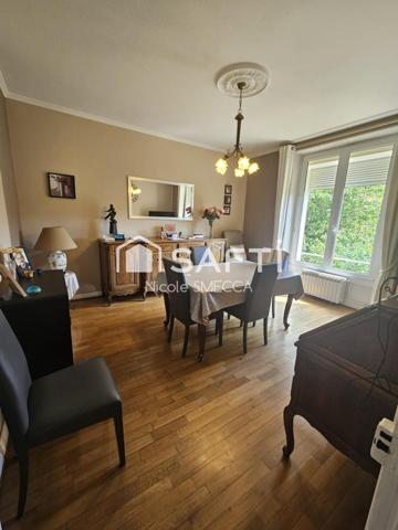 Maison mitoyenne d'un coté,3 chambres,garage...