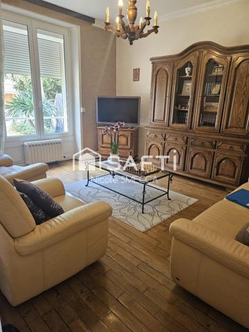 Maison mitoyenne d'un coté,3 chambres,garage...