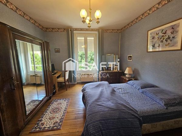 Maison mitoyenne d'un coté,3 chambres,garage...