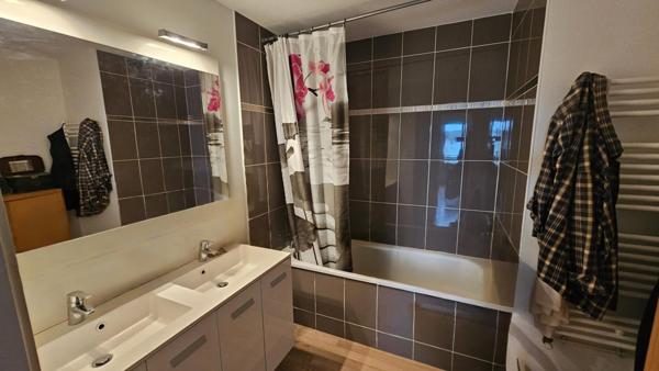 T3 situé dans un quartier recherché avec parking couvert