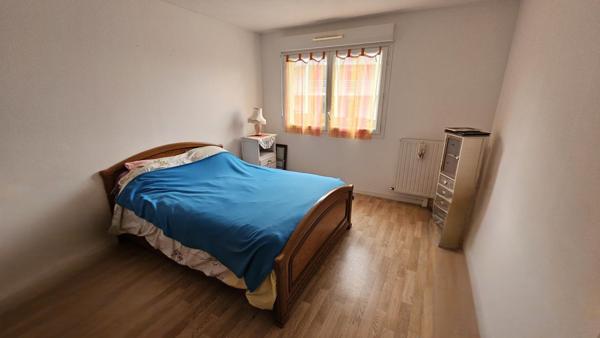 T3 situé dans un quartier recherché avec parking couvert