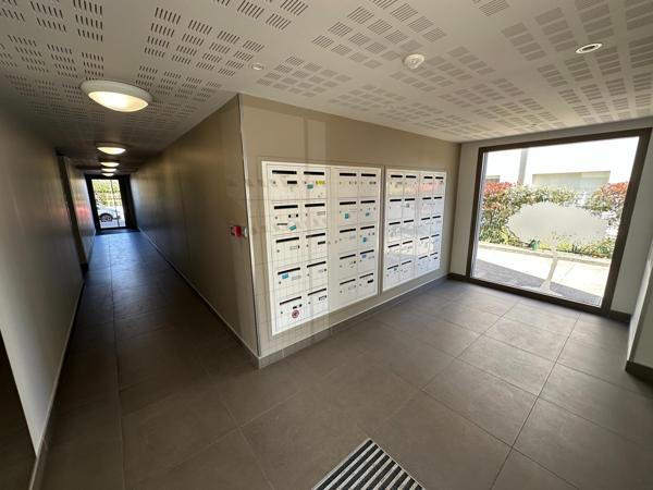 T3 situé dans un quartier recherché avec parking couvert