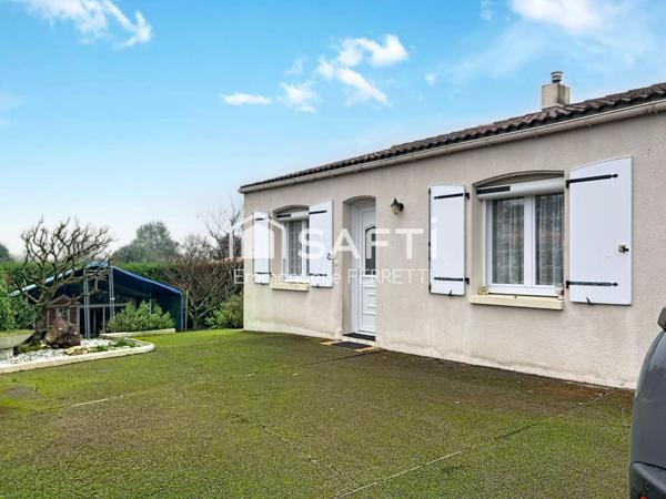 Maison de plain-pied au cœur du village – Calme, jardin et potentiel