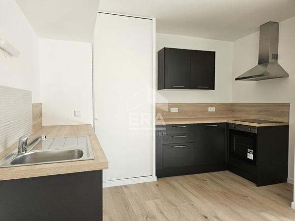 Grand appartement F4 avec 2 balcons et 2 places de parkings