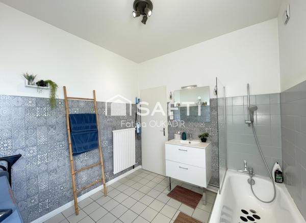 Appartement 3 pièces avec balcon, cave et deux places privatives– Rombas (57120)