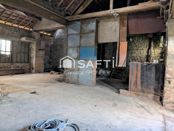 Ancienne longère en pierre avec atelier industriel à rénover