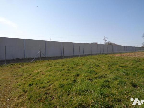 TAB 1460 m² dont 750 m² constructible non viabilisé exposé sud
