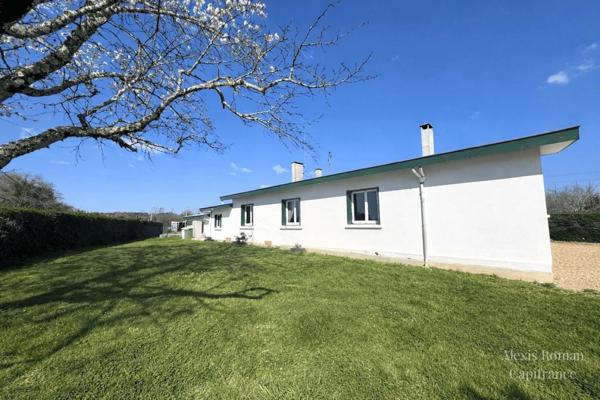 Maison de plain-pied 105 m² + double garage – env. 140 m² utiles – terrain 1 533 m² – proche commodités