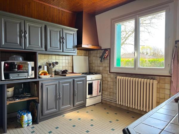 Maison de plain-pied 105 m² + double garage – env. 140 m² utiles – terrain 1 533 m² – proche commodités