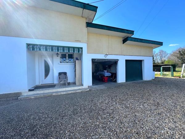 Maison de plain-pied 105 m² + double garage – env. 140 m² utiles – terrain 1 533 m² – proche commodités