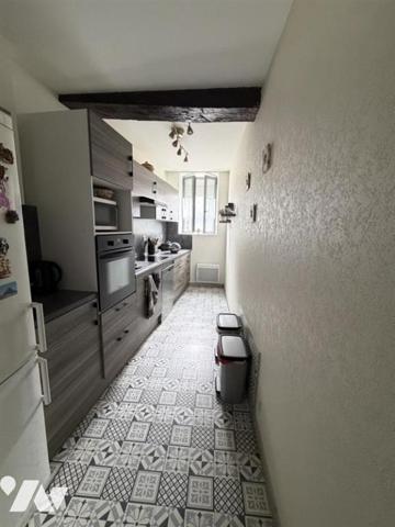 En centre ville de Joigny, un appartement de 3 pièces au premier étage
