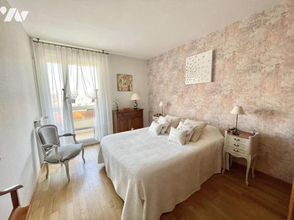 appartement 4 pièces avec balcons et garage.