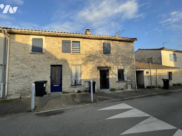 Ensemble immobilier constitué de trois logements locatifs.