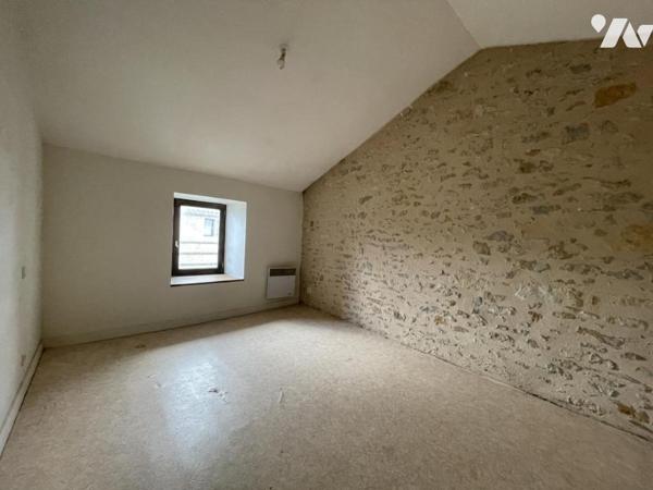 Ensemble immobilier constitué de trois logements locatifs.