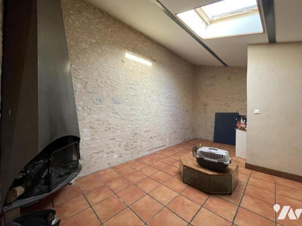 Ensemble immobilier constitué de trois logements locatifs.