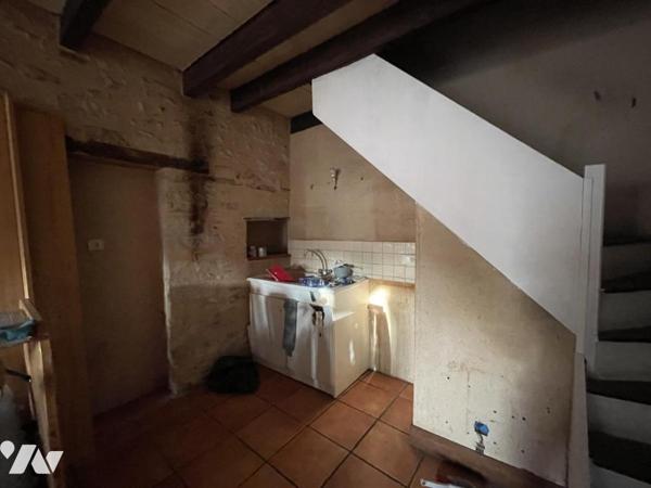 Ensemble immobilier constitué de trois logements locatifs.