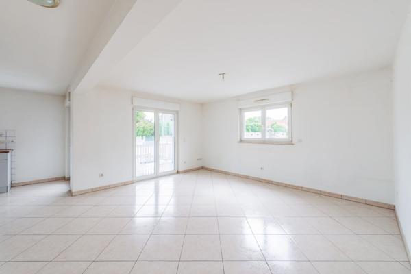 Appartement 3 pièces 75m², avec parking et garage double.