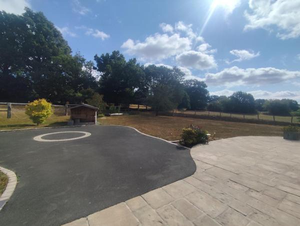 Charmante maison fonctionnelle avec beau terrain avec vue sur les champs !