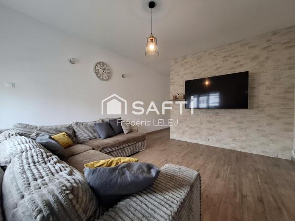 Grande maison rénovée avec beau jardin arboré