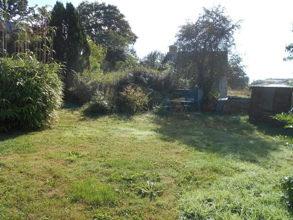 Ensemble de deux maisons avec jardin et vue dégagée