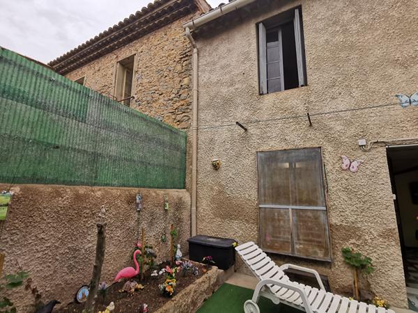 Maison en R+1 avec vie de plain pied et cour