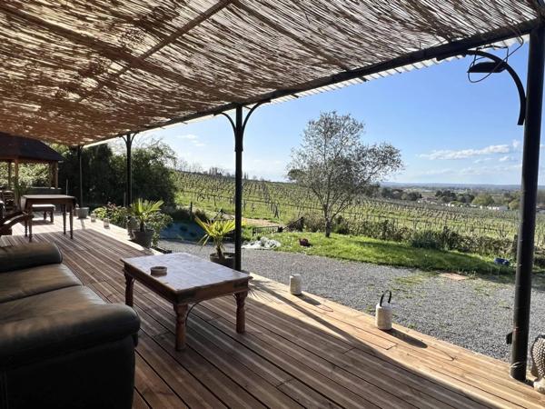 Maison de plain-pied, vue sur les vignes