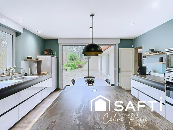 BIEN RARE SUR CAEN– MAISON FAMILIALE AVEC PISCINE DANS UN ENVIRONNEMENT EXCEPTIONNEL