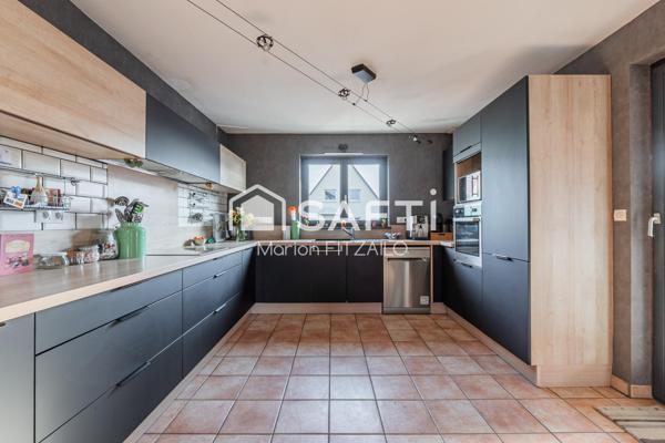 Maison 6 pièces dans quartier calme.