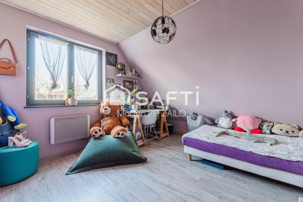 Maison 6 pièces dans quartier calme.