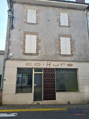 Immeuble avec local commercial et appartement