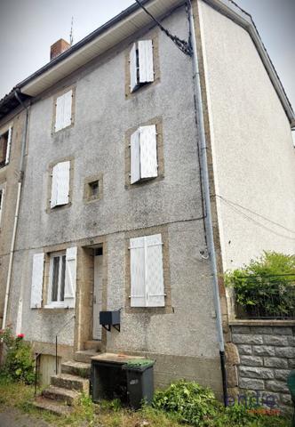 Immeuble avec local commercial et appartement