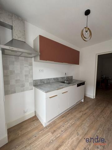 Immeuble avec local commercial et appartement