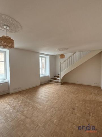 Immeuble avec local commercial et appartement