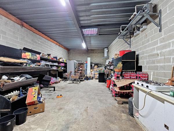 Immeuble avec appartement T4 de 136m² + murs commerciaux