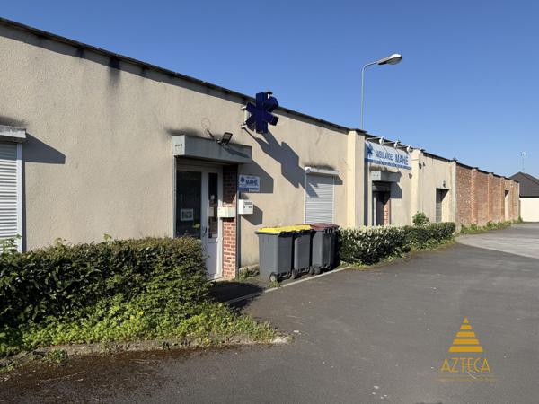 RARE – Ensemble professionnel 750 m² | Plein centre de Caudry | Parking privé clôturé ~100 véhicules