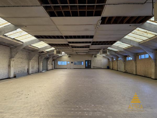 RARE – Ensemble professionnel 750 m² | Plein centre de Caudry | Parking privé clôturé ~100 véhicules