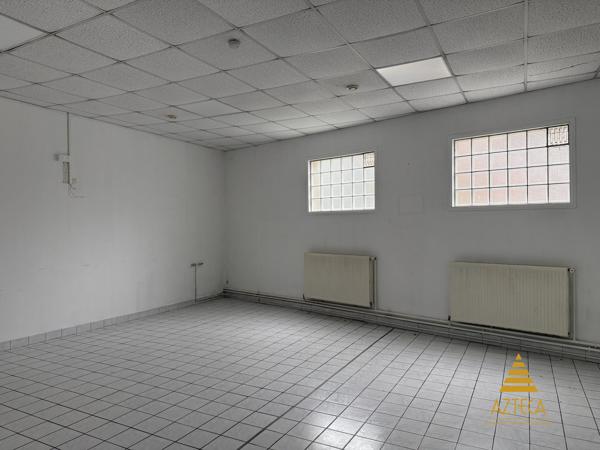 RARE – Ensemble professionnel 750 m² | Plein centre de Caudry | Parking privé clôturé ~100 véhicules