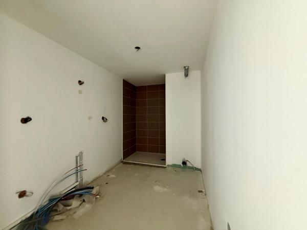 PONT L'ABBE (29)- Les Arcades : 2 pièces avec espace extérieur au cœur du centre-ville.