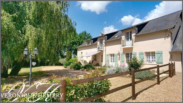 Cadre paisible pour cette propriété située en bord de rivière avec potentiel remarquable de gîte ou autre