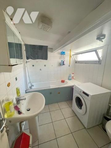 UNE MAISON A USAGE D'HABITATION